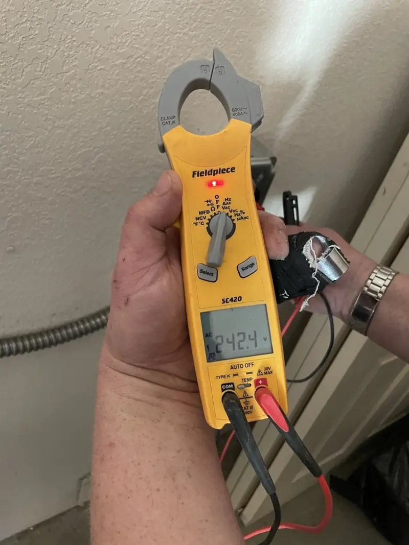 Voltage testing with clamp meter during Generator Installation in Bexley
